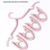 my-11134207-7r98o-lzzwr69vkj8p45.webp Random Folding Travel Clothes Hanger