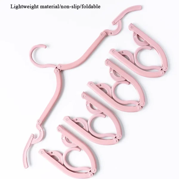 my-11134207-7r98o-lzzwr69vkj8p45.webp Random Folding Travel Clothes Hanger